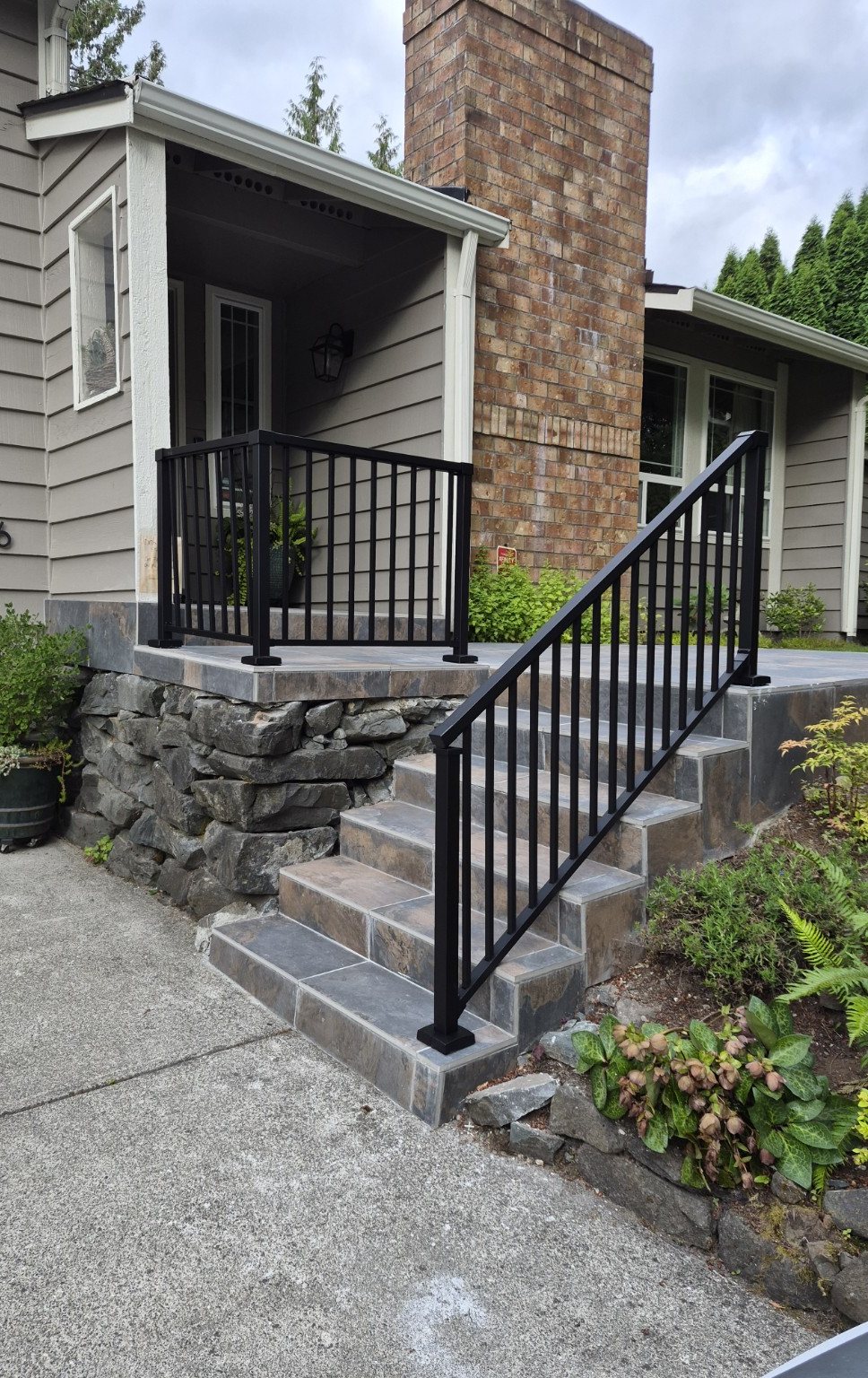 Exterior stair railing installation after