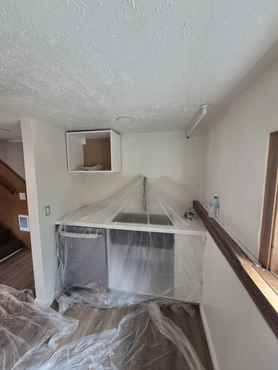 Kitchen protected during remodeling and painting